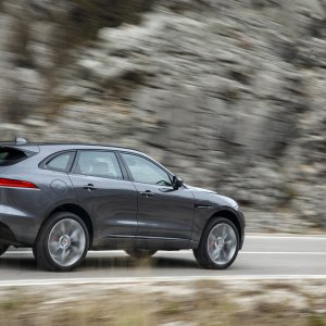 2017-Jaguar-F-Pace-First-Edition-rear-three-quarter-in-motion-03.jpg