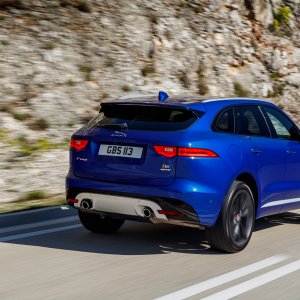 2017-Jaguar-F-Pace-First-Edition-rear-side-motion-view-and-mountain1.jpg