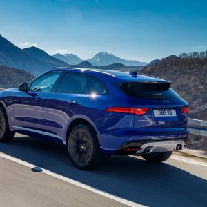 2017-Jaguar-F-Pace-First-Edition-rear-side-view-in-motion.jpg
